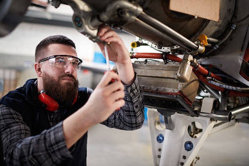 Aircraft mechanic in the hangar